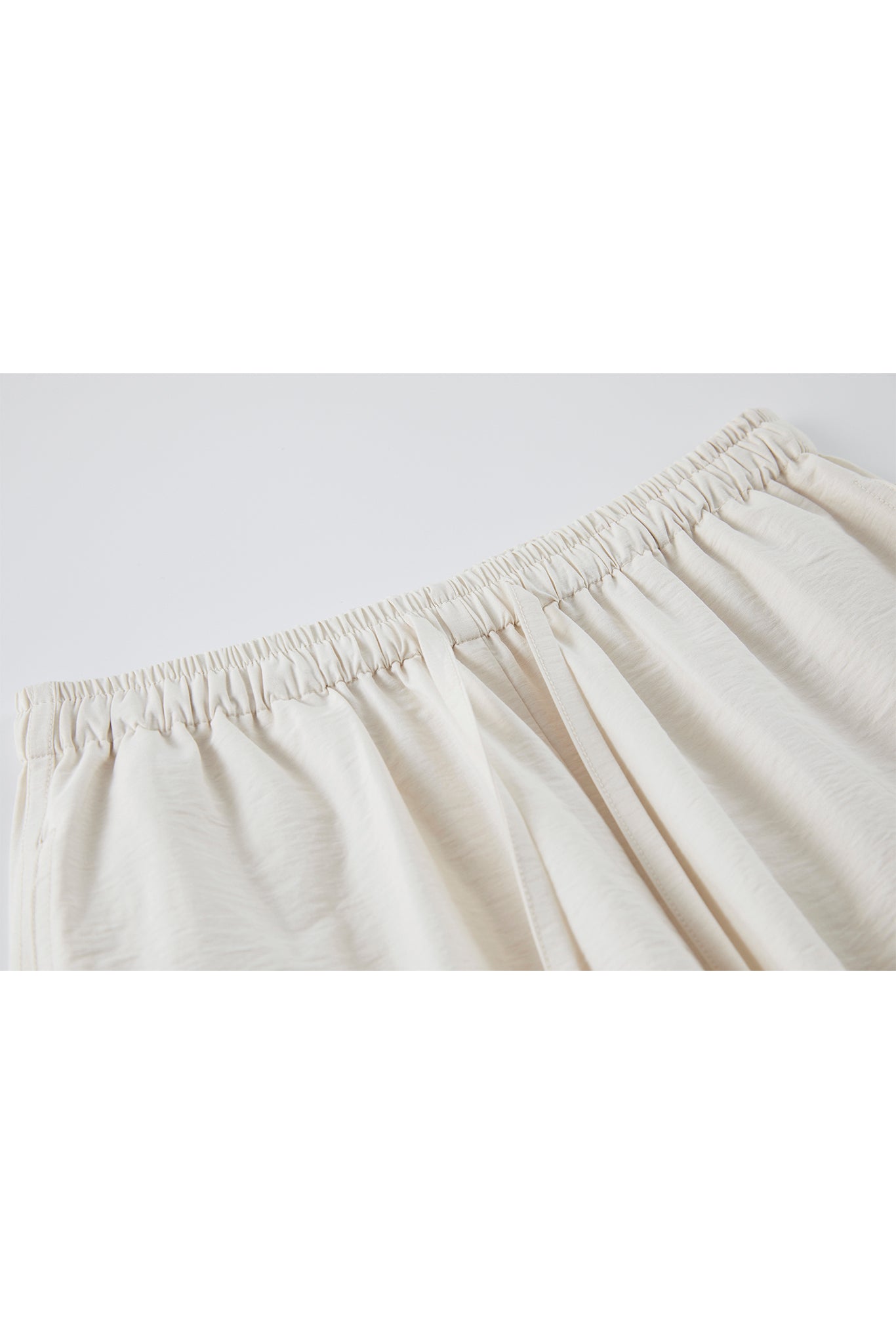 [tageechita] "T" embroidered Lina low straight pants