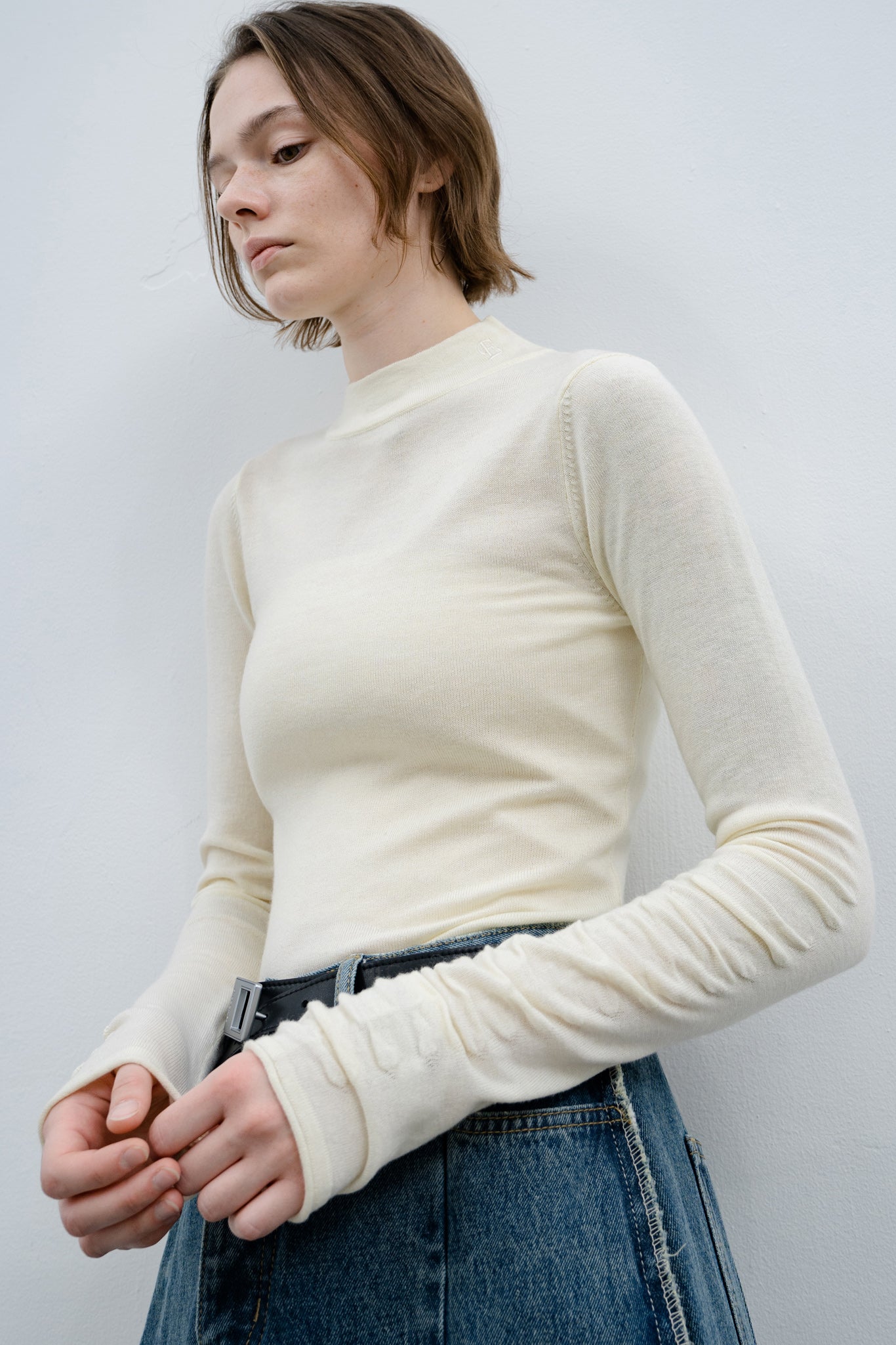 Gathered sleeve high neck knit tops 