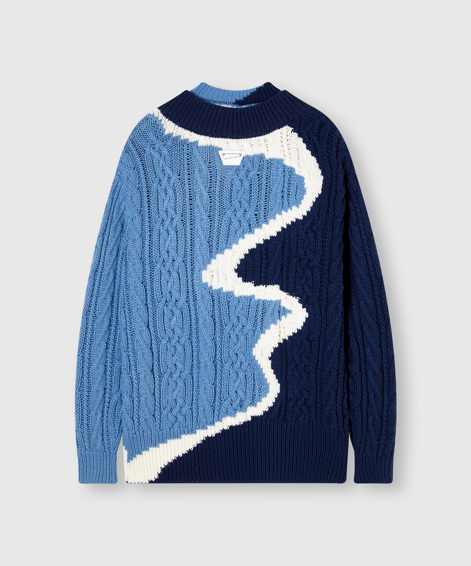 Abstract pattern jacquard over V-neck knit 