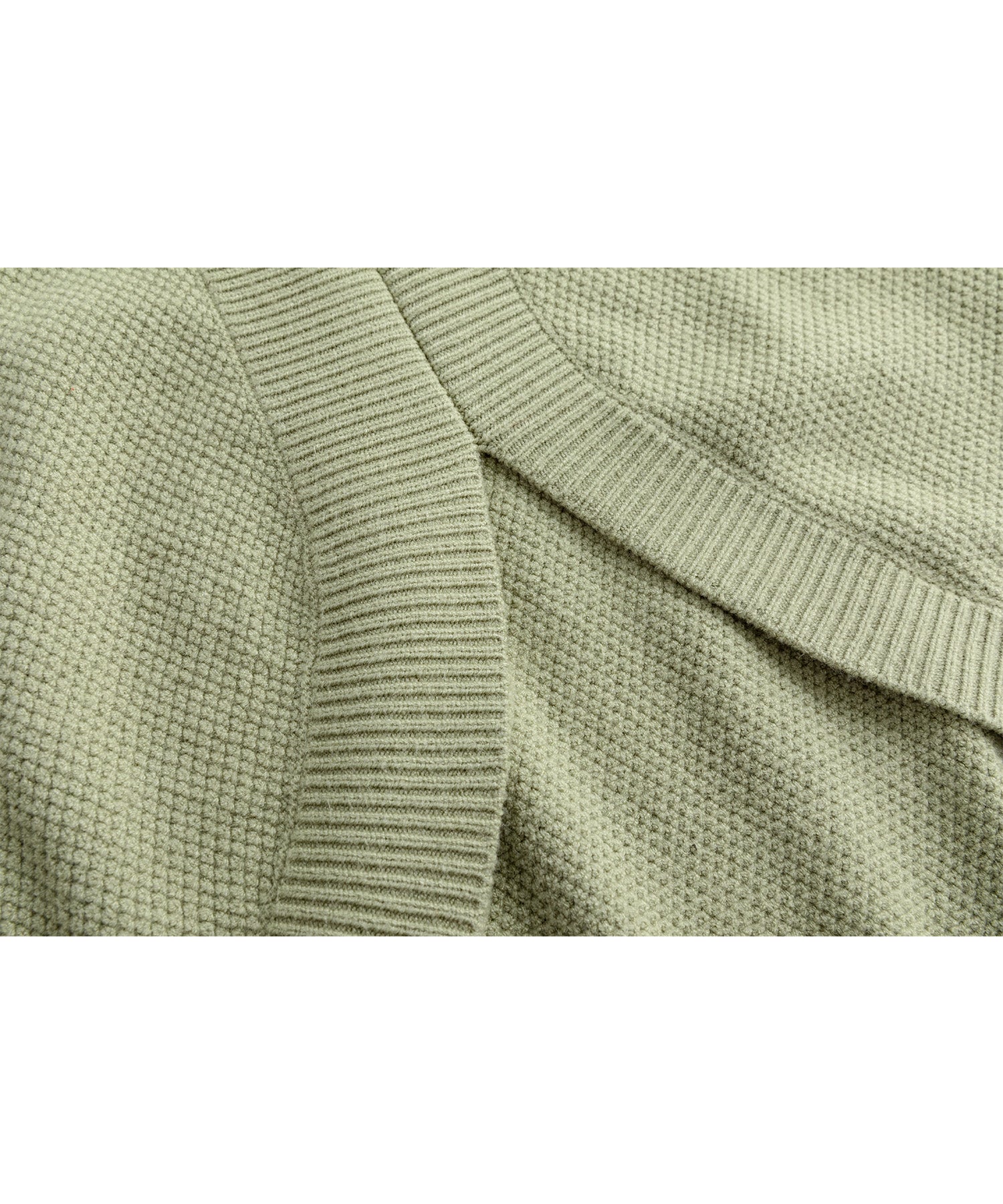 Round slit asymmetric design knit 