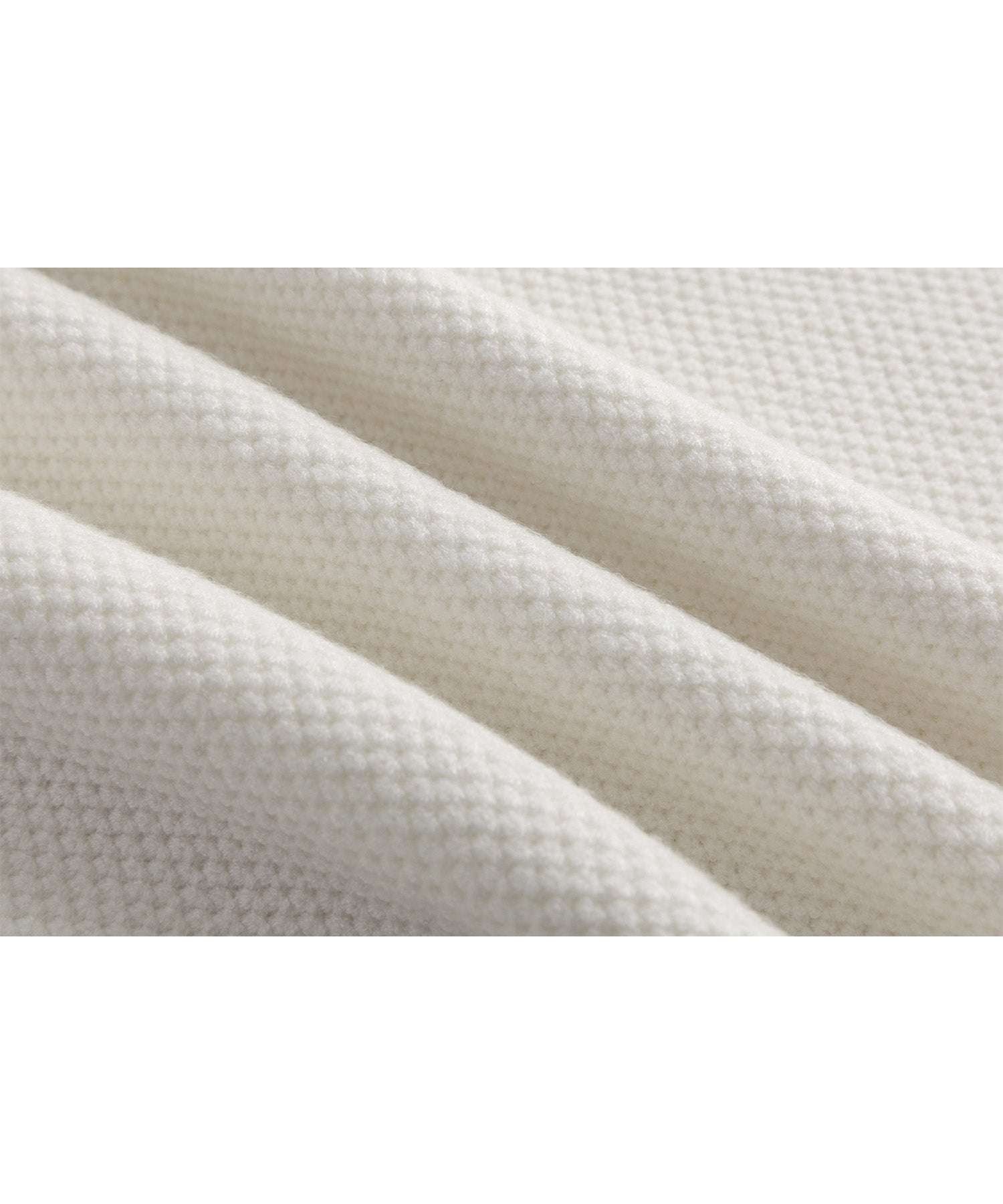 Round slit asymmetric design knit 